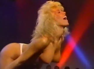 Candie Evans in Best Chest in the U.S. (1987)